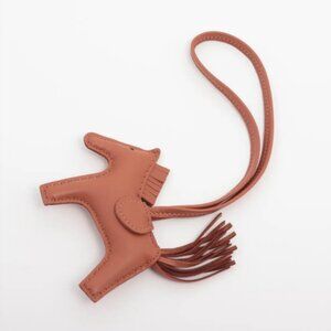 Hermès Rodeo Charm PM Gold